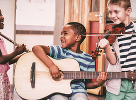 Normal_children-playing-musical-instruments-in-classroom-2021-08-30-06-01-12-utc