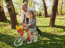 Normal_grandfather-helping-to-girl-with-bike-2022-11-03-16-59-06-utc