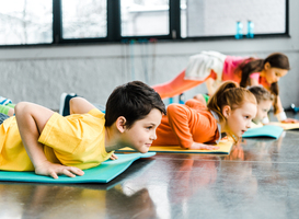 Normal_preteen-kids-doing-push-up-exercise-in-gym-2022-12-16-15-34-55-utc