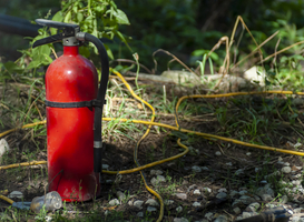 Normal_closeup-shot-of-a-water-extinguisher-and-firehose-2023-11-27-05-34-03-utc