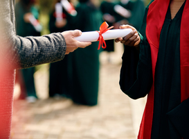 Normal_close-up-of-graduate-student-receiving-diploma-for-2023-11-27-05-21-34-utc