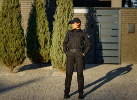 Normal_woman-police-officer-on-street-full-length-portrai-2023-11-27-04-49-23-utc