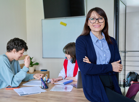 Normal_portrait-of-middle-aged-female-teacher-looking-at-2023-11-27-05-32-30-utc