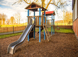 Normal_wooden-slide-on-the-playground-with-eco-friendly-s-2024-01-03-01-04-38-utc