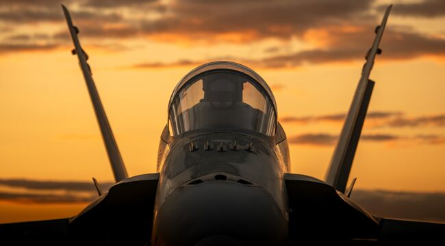 Carousel_fighter-jet-silhouette-at-sunset-2024-11-01-04-42-02-utc