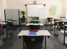 Normal_empty-classroom-with-desk-and-whiteboard-in-school-2023-11-27-05-29-52-utc