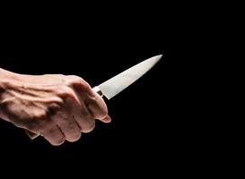 Normal_male-hand-holding-knife-on-black-background-2023-11-27-04-57-52-utc